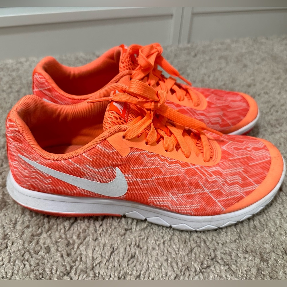 Nike Size 8, bright mango and white tennis shoe
